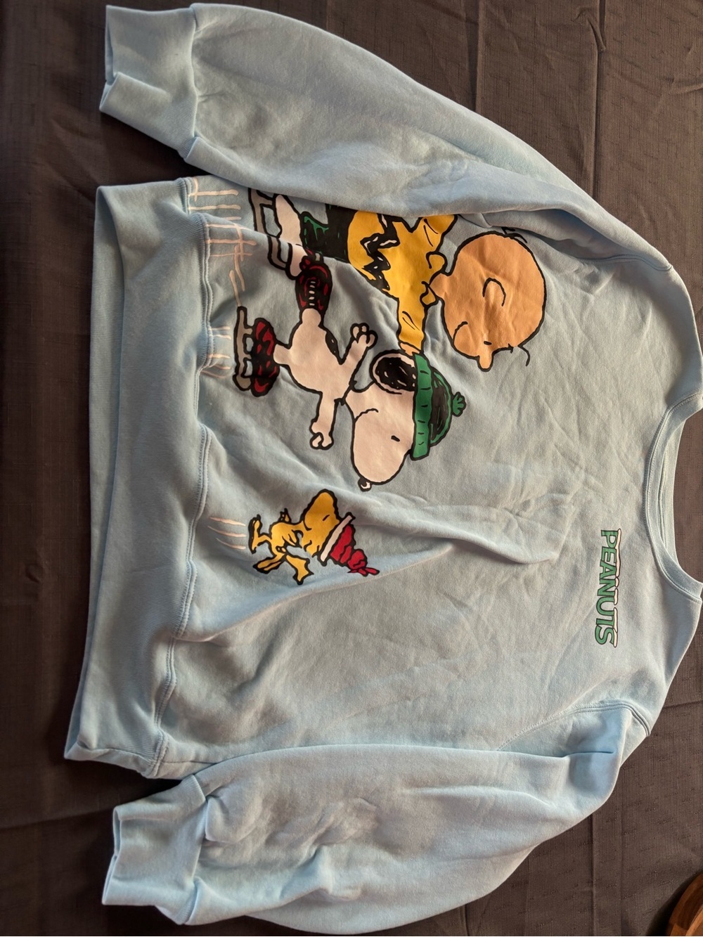 Peanuts Light Blue Crewneck Sweatshirt with Ice Skating Graphic - Picture 3 of 10